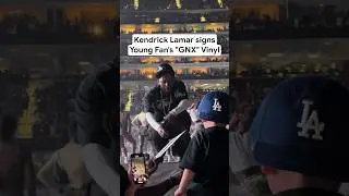 Kendrick Lamar signs Young Fan's 