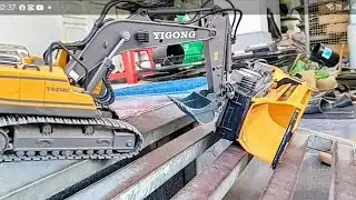 Xe máy cuốc đi ủi xe ben 