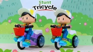 STUNT TRICYCLE TOY BIKE FOR KIDS.WITH 360 DEGREE ROTATION.COLORFUL 3D FLASHING LIGHT SOUND.No.yj3023