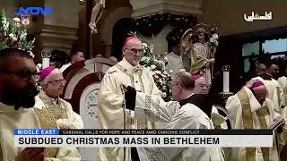 Subdued christmas mass in bethlehem