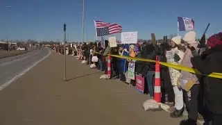 Protesters gather outside Trump event in Iowa