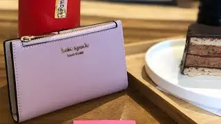 Kate Spade Spencer small slim bifold wallet violet mis