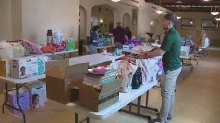 Community members drop donations off to help migrants in Chicago