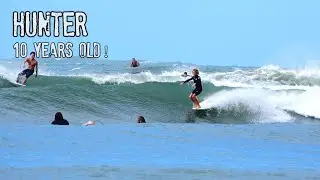Hunter - 10 years old - riding a SELF shaped true single fin LOG.