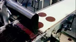 Chocolate depositing coating machine
