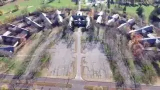 Central Islip Psychiatric Center Sunburst - drone aerial fly over asylum