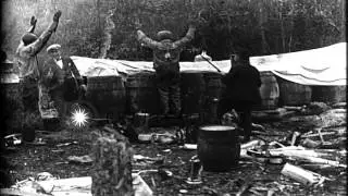 Federal agents raid a still in Dismal swamp during Prohibition at Suffolk, Virgin...HD Stock Footage