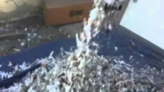 Rotating granulator or shredding machine for textile wastes, plastics, big-bags, raffia, fiberglass