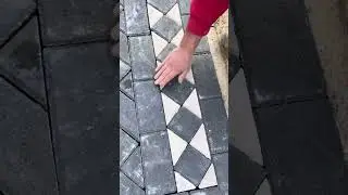installation of black and white combination bricks in the yard #construction #popular #shorts
