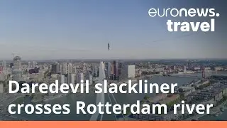 Daredevil slackliner struggles to keep his balance 150m above Rotterdam river