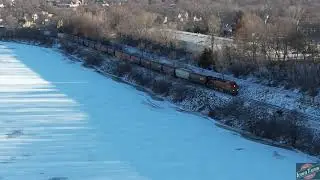 ICE JAMS and TRAINS! BNSF unit grain train and a long CN L571 along the ice jammed Cedar River!