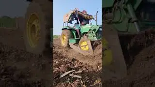 Tractor leveling in farm...