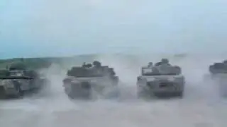M1 Abrams Tanks firing