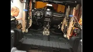 Raptor Lining my Jeep's interior and pre paint install of the Poison Spyder Tire Carrier