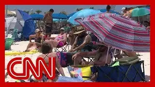 CNN reporter debunks Alabama beachgoers' Covid 19 theories