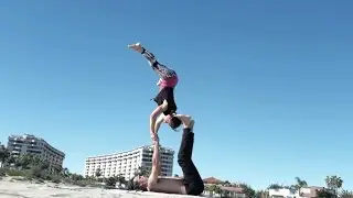 Acroyoga pop: Pop star to bat.