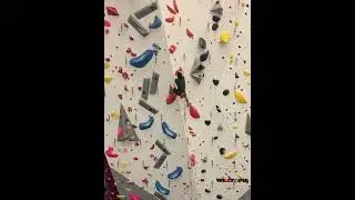 Lead climbing orange 5.11c