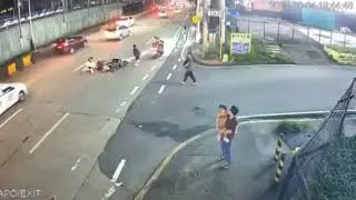 Skateboard accident causes motorcycle crash in Manila, Philippines