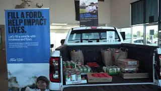 Ford dealership filling up truck bed for Madras Community Food Pantry