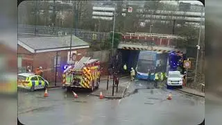 Double decker bus released after getting stuck under Luton bridge