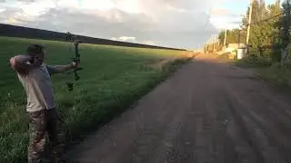 Long distance bow shooting (slow motion)