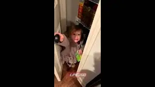 Toddler caught in pantry eating snacks