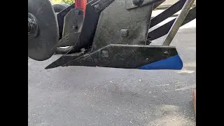 Welding up the heel piece on George's IH Little Genius Plow