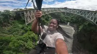 Zip lining from Zambia to Zimbabwe at Victoria Falls Bridge