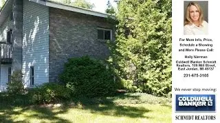 9836 Cinder Hill, Mancelona, MI Presented by Holly Nierman.