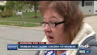 Crumbling road causing concerns for neighbors