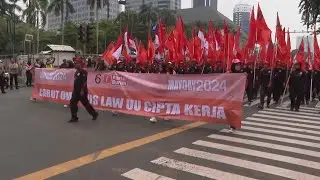 Indonesian workers vent anger on May Day at new law they say harms their rights