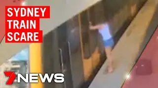 Woman dragged by Sydney train after getting arm caught in closing door | 7NEWS