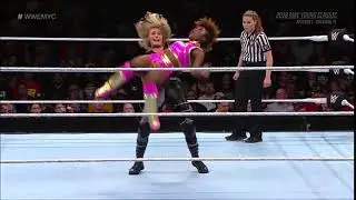 Rhea Ripley- Pumphandle Sitout Powerbomb