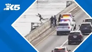 Crews rescue man who jumped off of I-90 Bridge