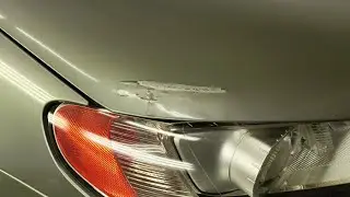 Car collision repair. Quick bodywork and paint job on a Volvo hood. Somekind of ASMR I guess.