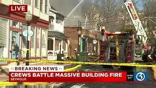 Crews battle massive building fire in Seymour