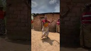 AfriMama vibing with her guitar
