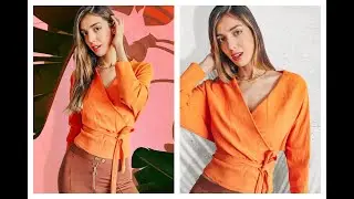 Pull cache c&oelig;ur orange avec n&oelig;ud