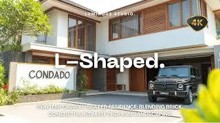 Contemporary L-Shaped Residence: Blending Brick, Concrete & Intimate Tropical Landscaping