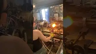 Learning to work on the lathe! So fun! #glassart #glassblowing #flameworking #lampworking #shorts