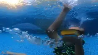 Blowing bubble rings into the camera