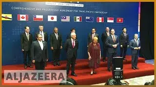 TPP trade agreement signed countering US protectionism | Al Jazeera English