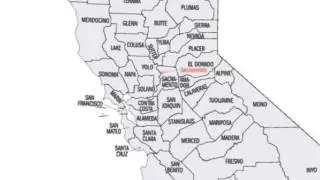 Voter database late, over budget