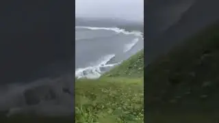 Man walking his dog captured an amazing moment as tsunami waves hit Russia&rsquo;s Kamchatka Peninsula.
