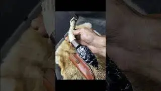 HAND KNAPPED OBSIDIAN KNIFE BY MARK MCCOUN.  Beginner knapper. Watch me evolve