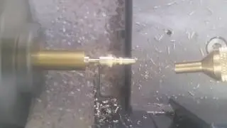 HW Safety catch being machined from brass using the Hercus PC200 and Digi9 Controller