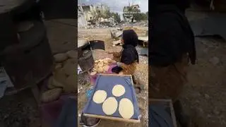 Palestinian women make bread between ruins of Gaza #shorts