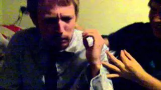 Eating a scorpion from a bottle of vodka