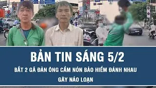 Sáng 5/2: 2 gã đàn ông cầm nón bảo hiểm lao vào đánh nhau gây náo loạn trên đường ở TP HCM