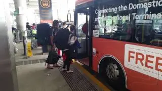 Brisbane Airport how to get to domestic terminal from international terminal